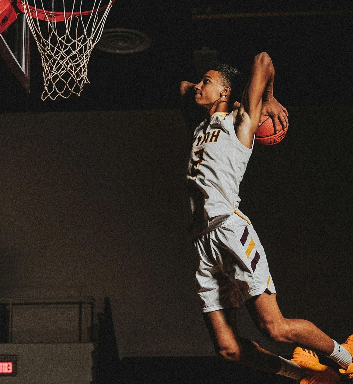 Athlete going up for a dunk